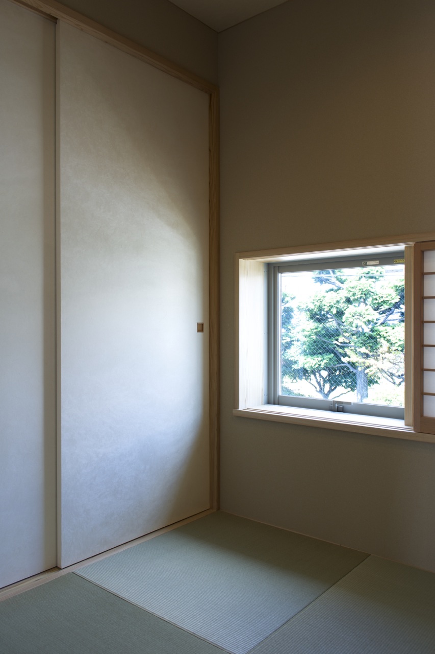 Japanese room with screens opened.   Japanese room with screens opened.